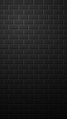 a black brick wall that is very dark