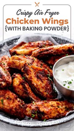 crispy air fryer chicken wings with baking powder in a bowl on a plate