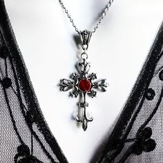 Ornate Cross Pendant Necklace Silver Magic Goth Crystal Fleur De Lis Spiritual Brand New In Original Package No Price Tags Attached Beautiful Ornate Cross Pendant With Red Crystal Stone Gem Silver Tone Chain Lobster Claw Clasp Great Gift ***Check Out My Other Great Items*** Bundle & Save $$$ ( 6g72) Tags Home, Country ,Collectable, Vintage, Figurine ,Office, Boho, Hippie, Stylish, Gift, Fashion, Surfer, Vacation, Beach, Unisex, Vegan, Minimalist, Western, Southwest, Native, Mid Century, Retro, C Red Emo Jewelry For Party, Red Gothic Metal Necklace, Gothic Red Necklace For Valentine's Day, Punk Red Necklace For Halloween, Red Gothic Cross Necklace, Red Emo Style Metal Jewelry, Red Emo Necklace For Gift, Vampy Jewelry, Red Cross Necklace