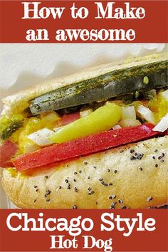 the chicago style hot dog is loaded with toppings and has a pickle on it