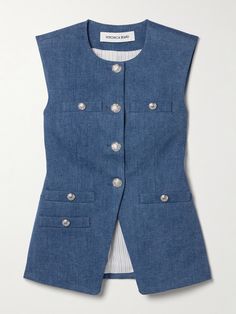 Veronica Beard's 'Tamara' vest is adorned with polished silver-tone buttons depicting the brand's regal crest. It's tailored from smooth denim and has a notched front, so it sits nicely over your hips. The full lining ensures a smooth fit. Luxury Miu Miu Tops For Workwear, Tailored Shirts For Women, Fitted Denim Vest With Snap Buttons For Work, Classic Denim Vest With Button Closure, Denim Vest With Buttons For Workwear, Fitted Denim Vest With Button Closure For Work, Classic Denim Workwear Vest With Pockets, Classic Denim Vest For Work, Classic Denim Vest With Button Closure For Work