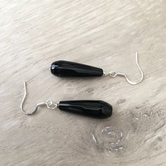 BLACK ONYX EARRINGS - Long Black Earrings - Black Gemstone Earrings Black Faceted Earrings - Faceted Onyx Earrings - Elegant Black Earrings These handcrafted black onyx earrings are simply gorgeous! Silver fish hooks featuring a beautiful 25mm x 8mm faceted black onyx gemstone and measuring 1.75 inches in length. Adds an elegant touch to any outfit! Item is carefully packaged and shipped via USPS in a sturdy protective mailer. Check out more fabulous jewelry and enter my shop here: https://www.e Minimalist Handmade Black Earrings, Black Hypoallergenic Earrings For Party, Black Dangle Plug Earrings As Gift, Black Dangle Plug Earrings For Gift, Black Minimalist Pierced Earrings, Black Minimalist Earrings For Jewelry Making, Handmade Black Teardrop Earrings For Party, Black Nickel-free Earrings For Party, Nickel-free Black Earrings For Party