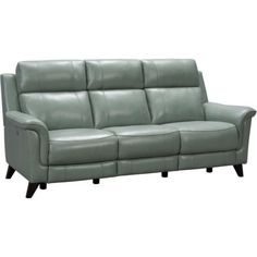 a light green leather reclining sofa with wooden legs and arm rests on an isolated white background