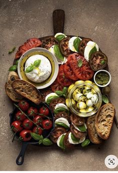 a platter filled with lots of different types of food