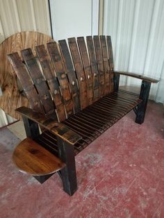 a bench made out of wooden pallets and some sort of slatted seat