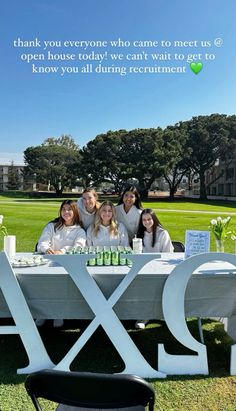 a group of people sitting at a table in front of a sign that says, thank you everyone who came to meet us open house today we can't wait to get to get to know