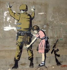 a painting on the side of a building depicts a soldier giving a girl a high five