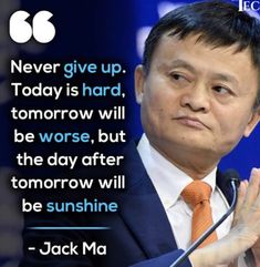 a man in a suit and tie giving a speech with a quote from jack ma