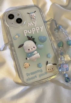 a phone case with an image of a puppy on it