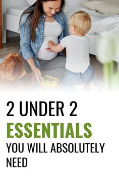 a woman holding a baby in her arms while looking at food on the floor with text overlay that reads, 2 under 2 essentials you will absolutely need