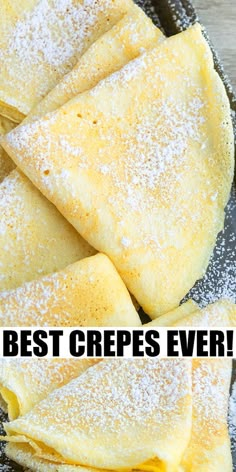 some crepes are on a plate with powdered sugar and the words best crepes ever