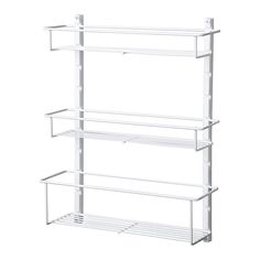 three white shelves are stacked on top of each other