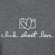 the back of a gray shirt that says, i'll shoot love on it