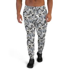 Introducing the All-Over-Print Men's Recycled Joggers--the perfect addition to your activewear and streetwear wardrobe! Whether you're powering through a yoga session, hitting the gym, or lounging at home, these joggers deliver both style and comfort. Crafted from a premium blend of 95% recycled polyester and 5% spandex, they feature a soft, cotton-feel fabric with a cozy brushed fleece interior. With a slim fit and cuffed legs, these joggers offer a flattering silhouette while maintaining flexibility for all your movements. Complete with practical pockets, an elastic waistband, and a white drawstring, these joggers are as functional as they are stylish. Designed for eco-conscious fashionistas, they are certified by both OEKO-TEX 100 and the Global Recycled Standard (GRS). For the perfect Gray Letter Print Joggers For Streetwear, Streetwear Wardrobe, Yoga Pants Men, Sweatpants For Men, Fitness Pants, Pants Streetwear, Printed Joggers, Pants Casual, Yoga Session