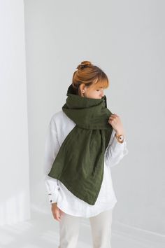 ✈    FREE WORLDWIDE EXPRESS DELIVERY FOR ALL ORDERS OVER 100 EUR (except for remote areas and Australia)! 🎁  FREE tea towel gift for all orders over 100 EUR value! Natural Linen Scarf With Wool Filling / Dark Green Soft Linen Woolen Scarf This simple and cozy linen scarf is eco-friendly. This handmade and sustainable item is pre-washed, softened, and looks better and better with age and every wash. Made of high-quality, pure, and natural European linen outside and wool filling inside, it keeps Woolen Scarf, Linen Layers, Woolen Scarves, Linen Scarf, Tea Towel Gift, Linen Scarves, Free Tea, Green Soft, Wool Wrap