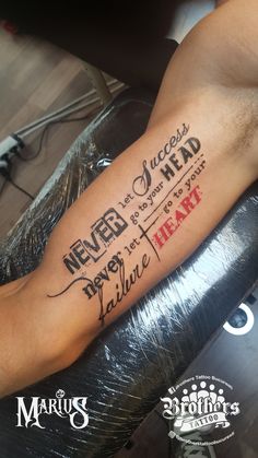 a person with a tattoo on their arm that says never, always, and never