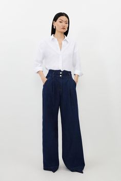 Fashion-Forward And Undeniably Flattering, These Denim Trousers Are An Instant Wardrobe Staple. This Versatile Pair Can Be Easily Styled For Everyday Plans, Or Elevated For The Night With The Addition Of Heels And Accessories. A Wide Leg Cut Ensures A Flattering Look, While Side Pockets Add Functionality.Denim Fabricwide Leg Cutside Pocketsbelt Loops