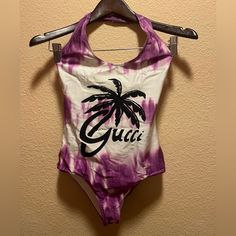 New Authentic Gucci One Pice Swimsuit In Perfect Condition. Never Worn And Still With Tags Attached. Swimsuit Features Gucci Logo On Front Part. Size Xs Women’s Size L Women’s Gucci Swimwear For Summer, Gucci Beachwear Swimwear For Summer, Gucci Fitted Summer Swimwear, Gucci Beachwear For Summer, Designer Beach Swimwear For Summer, Designer Summer Swimwear For Beach, Gucci Floral, One Shoulder Swimsuit, Pink One Piece