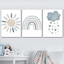 three paintings on the wall in a child's room, one with a sun and rainbow