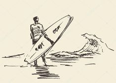 a man holding a surfboard standing in the water