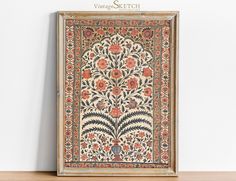 an intricately designed rug is displayed on a shelf in front of a white wall