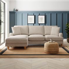 a living room with blue walls and beige furniture