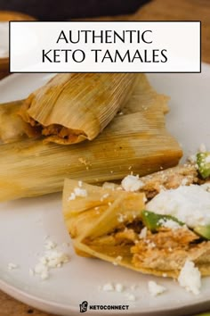 two tamales are sitting on a white plate