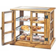 a wooden display case filled with lots of pastries