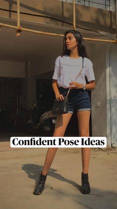 a woman standing in front of a building with the words confident pose ideas