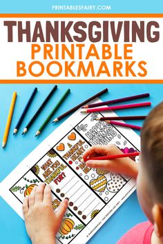 a young boy is doing thanksgiving printable bookmarks with colored pencils on the table