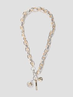 Necklace featuring entwined silver-tone and gold-tone chains. Completed by logo and crystal charms.