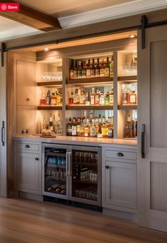 a home bar with lots of bottles and glasses