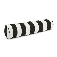 a black and white striped roll pillow