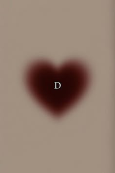 a heart shaped object with the letter d in it