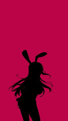 the silhouette of a woman with long hair and a rabbit ears on her head, standing in front of a pink background