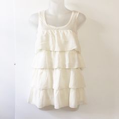 Nwt H&M Cream Ruffled Layered Top, Very Cute And Flowy. Brand New, Never Worn. Small Makeup Mark Inside Will Wash Out, It Was Bought That Way. Casual White Tiered Top, White Tiered Casual Tops, Chic White Tiered Top, Cream Sleeveless Blouse With Ruffles, White Tiered Summer Top, White Tiered Tops For Summer, White Tiered Top With Ruffle Hem, Sleeveless Cream Blouse With Ruffles, Summer Tops With Tiered Ruffle Hem