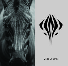 a zebra standing next to a black and white photo with the words zebra one on it