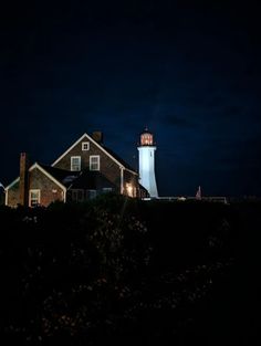 the light house is lit up at night