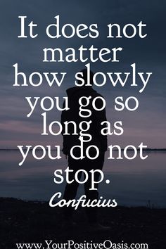 a person standing in front of water with the words it does not matter how slowly you go so long as you do not stop