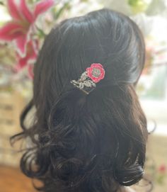 This is a unique handmade floral hair accessory, up cycled from an original  vintage brooch. This vintage up cycled silver tone flower hair comb features a pretty pink rose design set with marcasite stones with cold painted cerise pink and brown enamel. The perfect bridal hair accessory for a vintage inspired wedding.  These style brooches were popular in the 1950's and onward. The brooch pin is still intact and has been wired onto the hair comb, so that you could remove and wear again as a brooch if you wish.  What is marcasite? - Marcasite is a faceted grey stone called pyrite. All the stones are present but as a preloved, piece will show slight signs of wear relative to its age.  Vintage jewellery is another way to reduce your carbon footprint as these beautiful unique pieces have alrea Pink Rose Hair, Vintage Bridal Hair Accessories, Vintage Bridal Hair, Floral Wedding Hair, Theme Vintage, Marcasite Jewelry, Bridal Hair Accessory, Floral Hair Combs, Eco Wedding