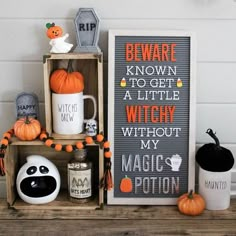 a shelf with halloween decorations on it and a sign that says, beware known to get a little witch without my magic potion