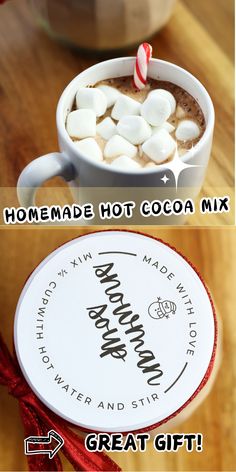 hot cocoa mix in a mug with marshmallows and candy cane on top