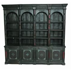 an old wooden bookcase with glass doors