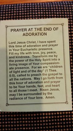 a prayer for the end of adoration on a tablecloth with an image of jesus