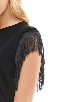 This women's knit Tee with fringe details is super cute to spice up your outfit. Crew neck knit t-shirt with fringe details Hand wash cold water Color : black Fringe Tshirt Diy, Fringe Shirt Outfit, Fringe T Shirt, Black Fringe Top, Fringe Tee, Fringe Tshirt, Trendy Fringe, Fringe Clothing, Fringe Blouse