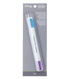 a white and blue pen sitting inside of a package