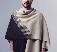 Ruana Eclipse ---------------- Chomba - Ruana Eclipse of Knitted Fabric Wool and Polyamide, Handmade Unisex Sober unisex ruana that goes with any look. It is named after the astronomical event was seen in Chile, one of the places with the best sky in the world for watching the stars The ruanas are open ponchos with designs for lovers of the original Latin American symbologies. Ideal for all year round and enjoy the outdoors as well as the city We work with 2 types of wool, with different textures and characteristics, but all made on knitting machines. They are easy to wash, you can wash them in "wool program" or by hand Composition: 30% wool - 70% polyamide (hypoallergenic)  Thickness: medium thick Measurements: 120 cm wide x 85 cm long ---------------- Standard size - Unisex - No Gender. Hand Composition, Watching The Stars, Open Poncho, Stitch Art, Different Textures, Latin American, For Lovers, Ponchos, The Outdoors