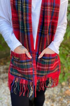 A super functional, cozy and cute winter scarf! This scarf features a plaid print, fringe edges and even has pockets to help keep your hands cozy warm. Casual Plaid Scarves For Cold Weather, Red Casual Scarves For Fall, Casual Red Scarf For Fall, Scottish Plaid Winter Scarf, Casual Red Winter Scarf, Cozy Red Scarves For Winter, Casual Red Scarf For Cold Weather, Fleece Scarf Pattern, Flannel Shirt Refashion