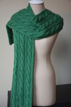 In the spirit of Spring and St. Patrick's Day I hand knit this green scarf out of pure baby alpaca yarn. This yarn is super soft next to skin and warm! Measuring 7x70 inches / Matching Hat also Available. The cable pattern is a classic Irish style and makes a perfect gift for Him or Her! Hand wash for best care / Hand-made to each order . . . other colors available by request. Ships in 10-14 Days Stay Toasty My Friends! Mens Scarf Knitting Pattern, Wool Knit Scarf, Burgundy Scarf, Super Scarf, Irish Style, Cable Scarf, Cable Knit Scarf, Merino Wool Scarf, Alpaca Scarf