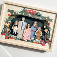 a family portrait made out of paper